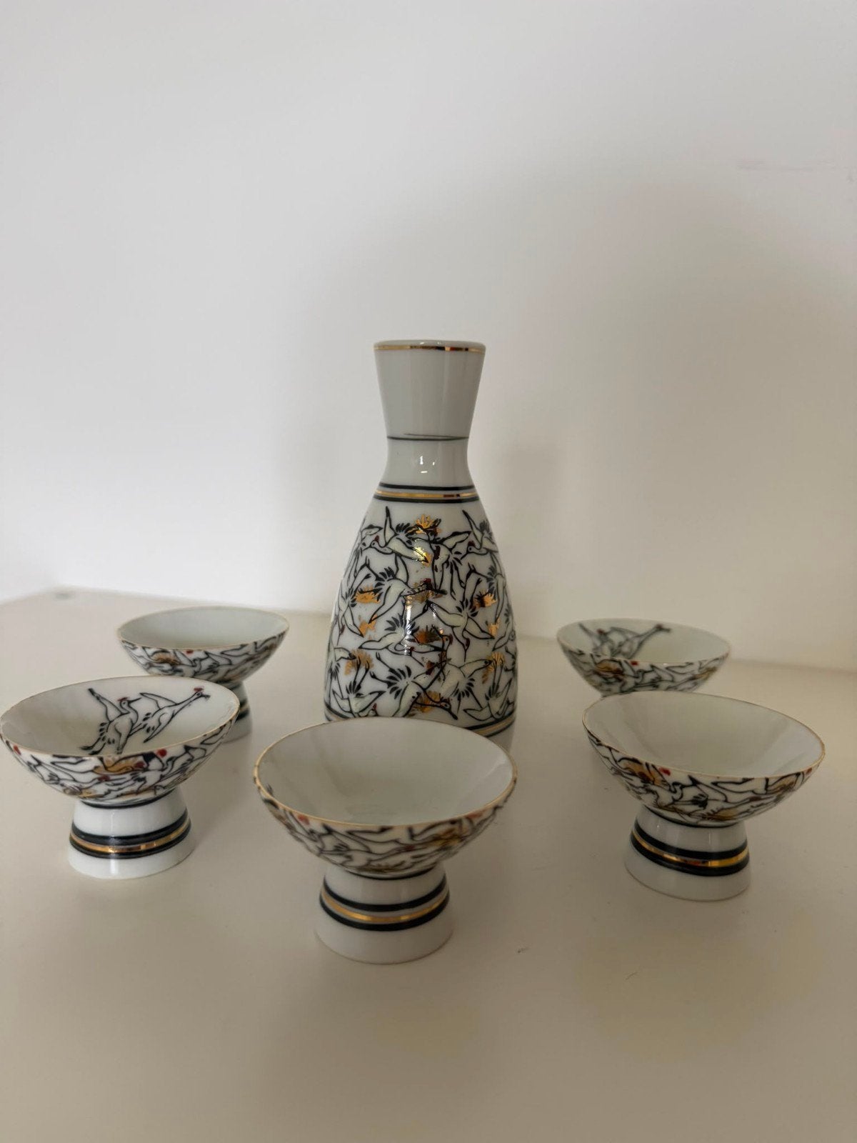 sake set met handbeschilderde kraanvogels, Ophalen