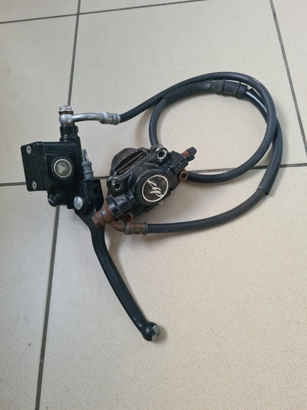 Étrier de frein Piaggio Zip avec tuyau et pompe de frein 50c, Vélos & Vélomoteurs, Enlèvement ou Envoi