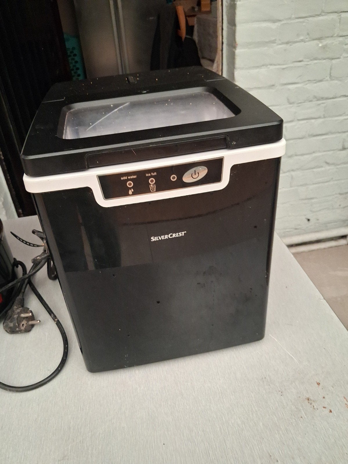 ijsblokjesmachine, Enlèvement