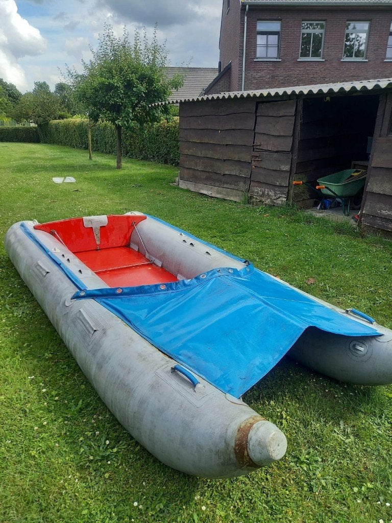 Complete set: Wiking rubberboot, 4pk motor, trailer, Watersport en Boten, Rubberboten, Gebruikt, Overige merken, Hout, Anker, Inclusief motor