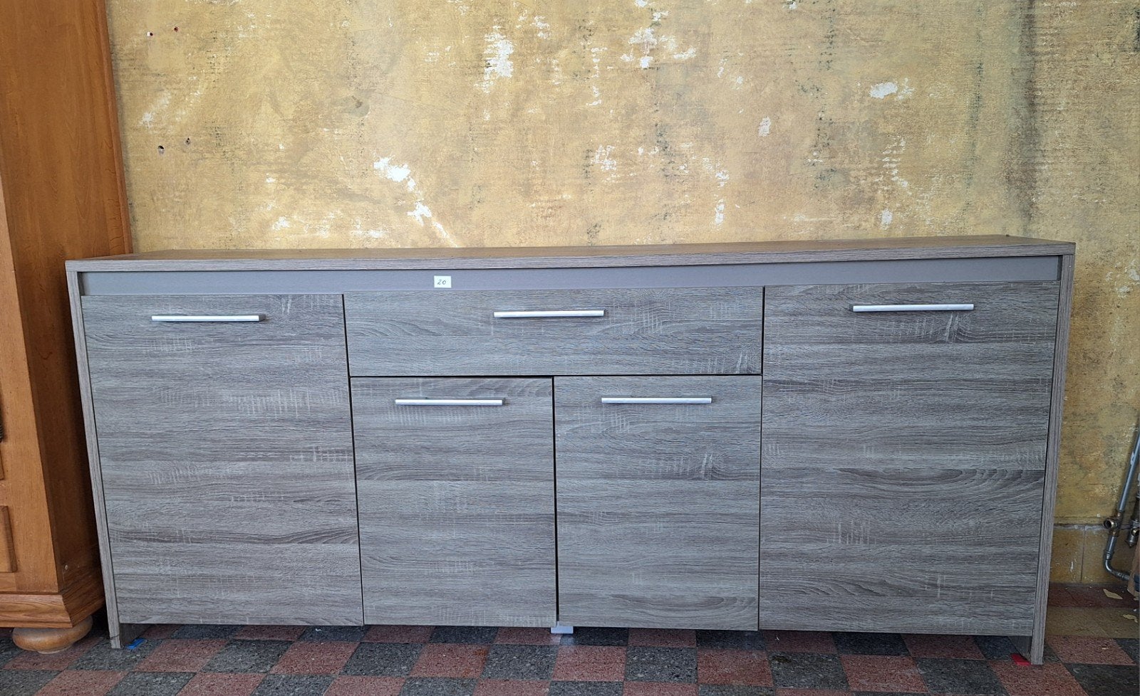 Grijze dressoir kast, Enlèvement