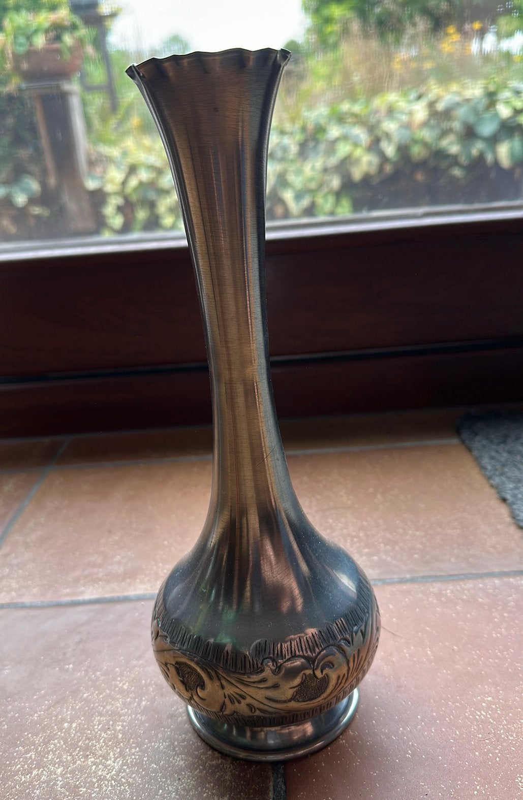 Vase soliflore en étain, Enlèvement