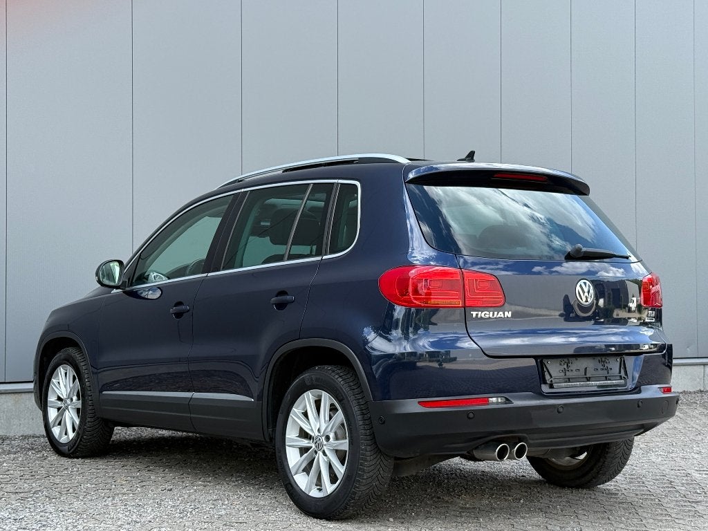 Volkswagen Tiguan 2.0TDi Pano ElekZetel Cruise Navi DigAirco, Auto's, Voorwielaandrijving, Euro 5, Zwart, 4 cilinders