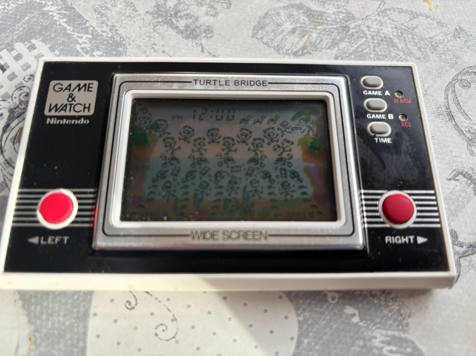 Game & Watch Nintendo « Turtle Bridge » 1982 (modèle TL-28), Enlèvement ou Envoi, Comme neuf, Autres modèles