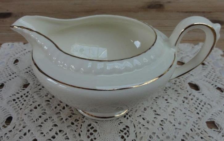 Mosa melkkannetje met goud kleurige randjes, Antiek en Kunst, Curiosa en Brocante, Ophalen of Verzenden