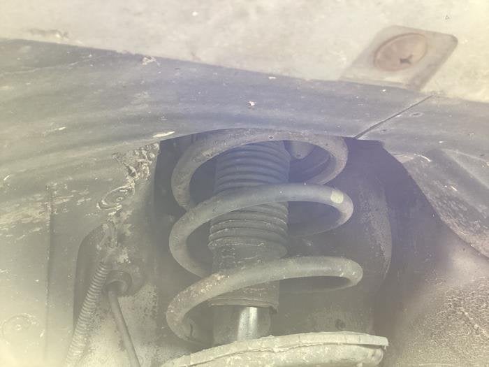 Amortisseur avant gauche d'un Kia Sportage, Kia, -, 3 mois de garantie, Utilisé