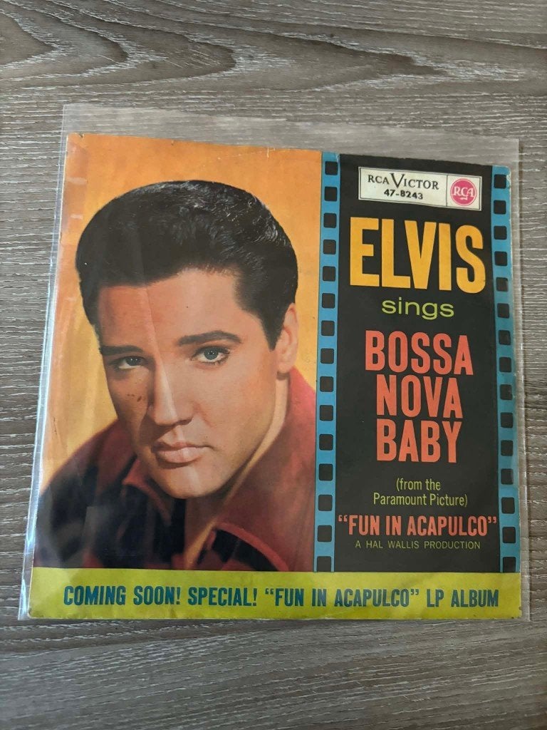 Elvis single, Bossa nova baby/witchcraft, Duitse persing,, Enlèvement ou Envoi, Rock 'n' roll, Utilisé, Housse de protection extérieure