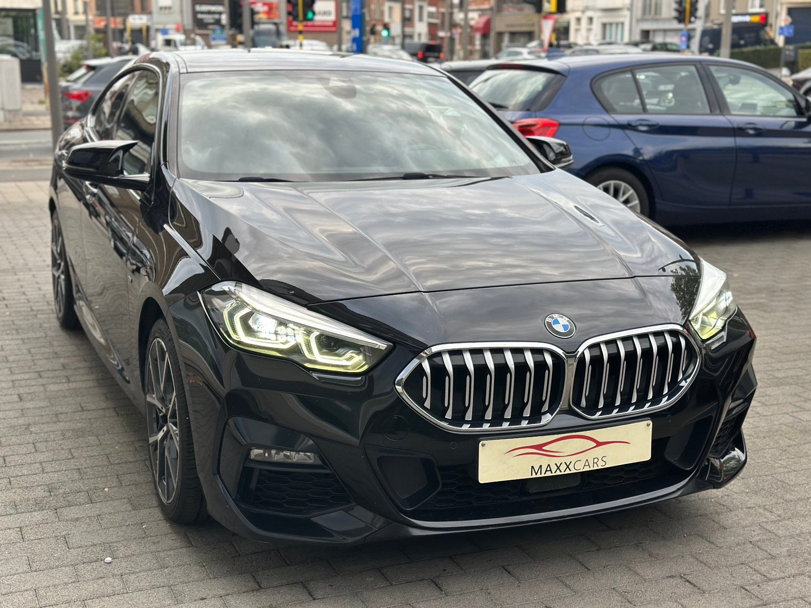 BMW 218i Gran Coupe Aut. M-pakket 2021, Auto's, Dealer onderhouden, Bi-Xenon koplampen, Zwart, Bedrijf