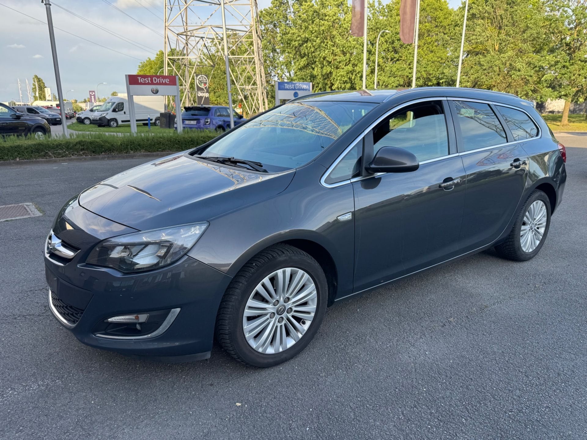 Opel Astra Sports Tourer, Auto's, Voorwielaandrijving, Euro 6, 4 cilinders, Leder en Stof