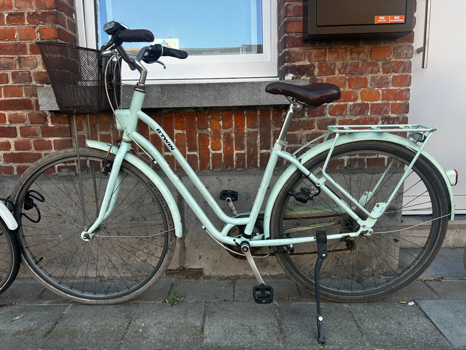 Oude fiets B-Twin, Ophalen