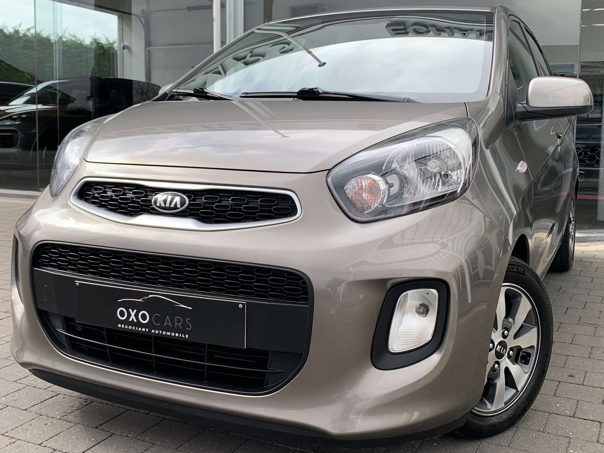 Kia Picanto 1.0i / Grand Gps / Airco / Camera / Bluetooth /, Auto's, Voorwielaandrijving, Stof, Gebruikt, Euro 6