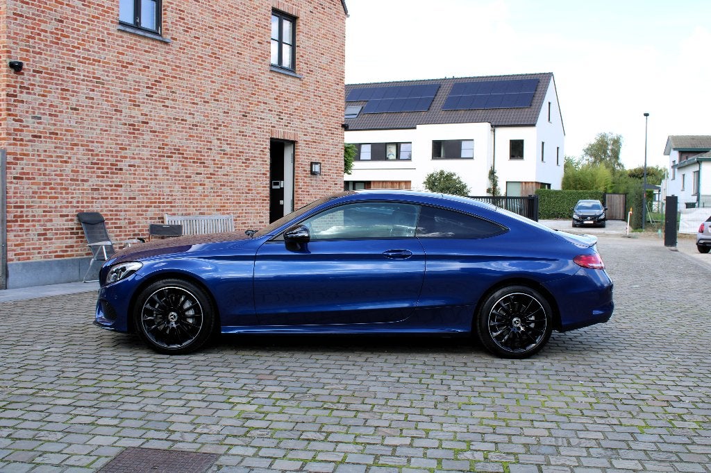 Mercedes-Benz C 180 Coupe automaat AMG pakket, Auto's, Automaat, Achterwielaandrijving, 4 cilinders, Blauw