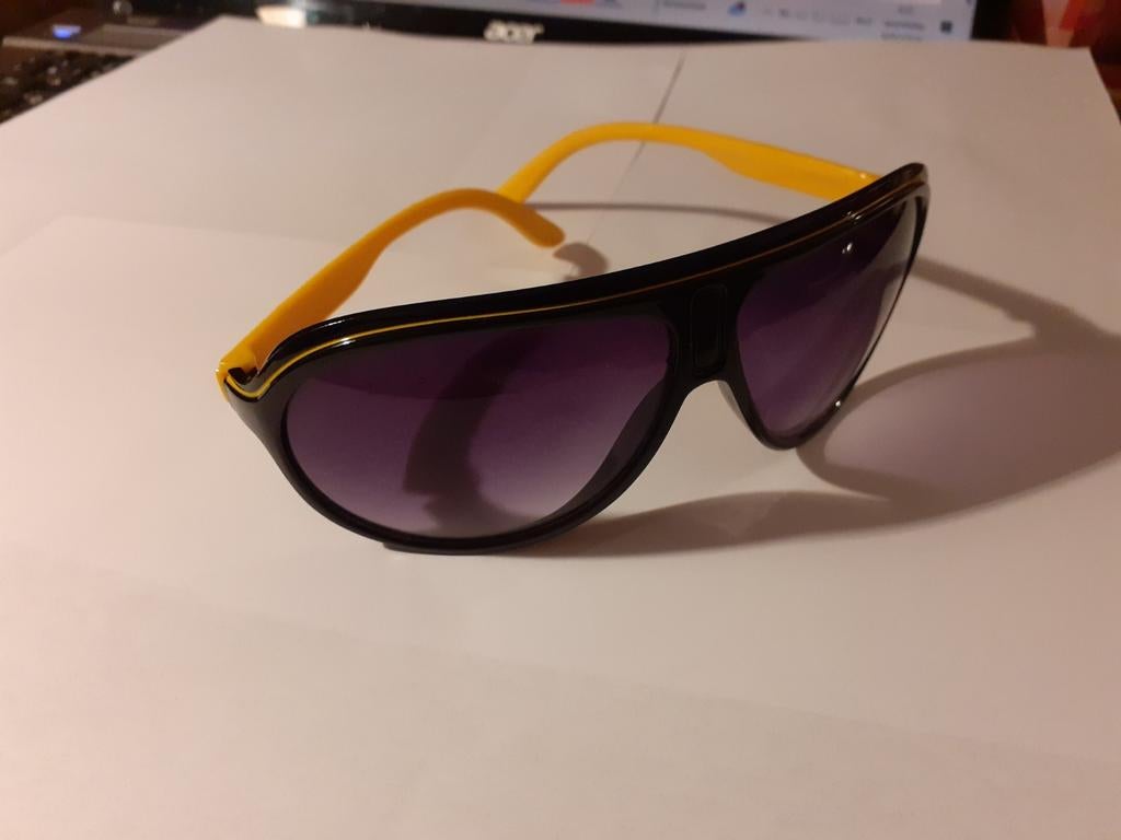 Retro zonne/ski bril unisex., Ophalen of Verzenden, Zo goed als nieuw, Zwart, Zonnebril