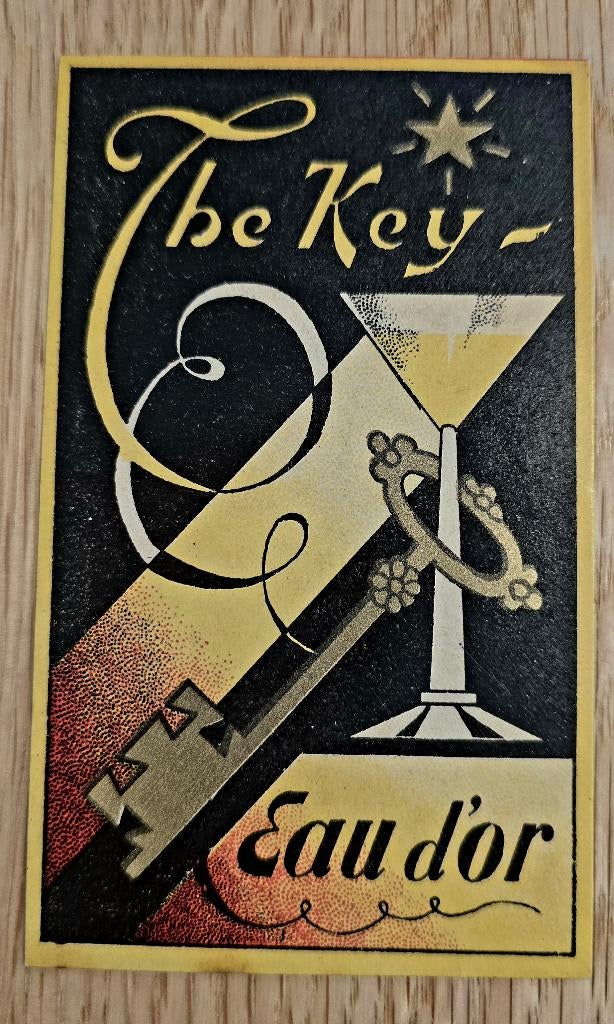 The Key — Het oude label van Eau d'Or - Label 124, Ophalen of Verzenden, Overige typen