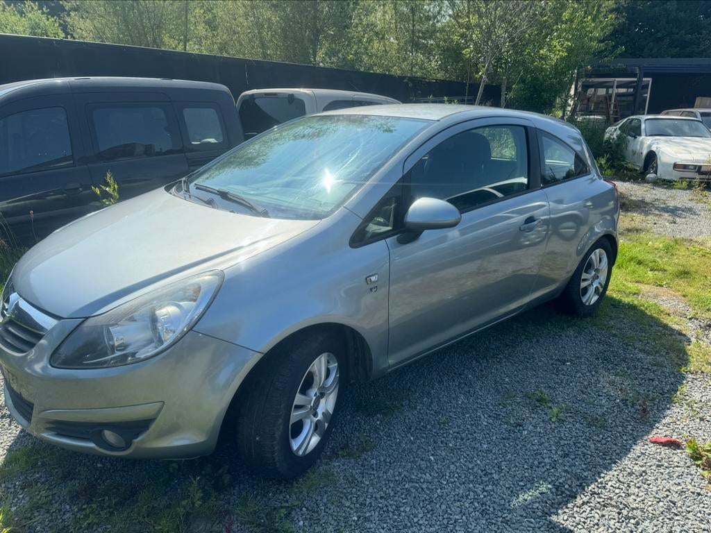 Opel corsa 1.3 diesel bj 2010 km 176440 mooi auto, Auto's, Stof, Zwart, Lichtsensor, Bedrijf