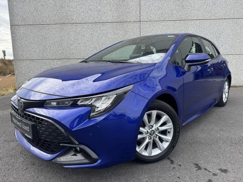 Toyota Corolla 1.8 e-CVT Hybrid CVT Dynamic Plus + Business, Auto's, Automaat, Parkeersensor, 72 kW, Blauw