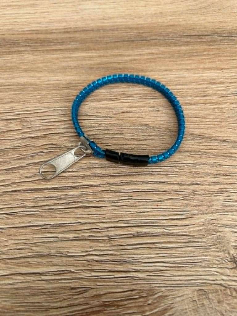 Bracelet tirette bleu, Enlèvement, Comme neuf, Bleu, Autres matériaux