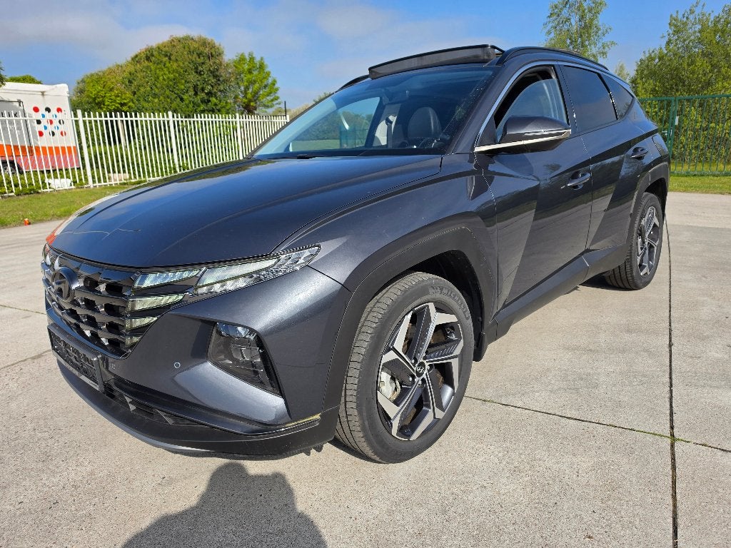 Hyundai Tucson 1.6 T-GDI Hybride Pano Full Option + Garantie, Auto's, Automaat, Leder, Bedrijf, 5 zetels