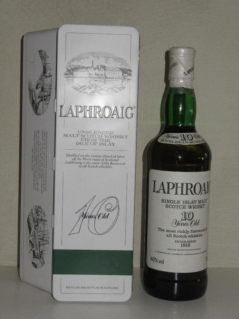 Laphroaig 10y met origineel tin, jaren 80, Verzamelen, Ophalen of Verzenden, Zo goed als nieuw