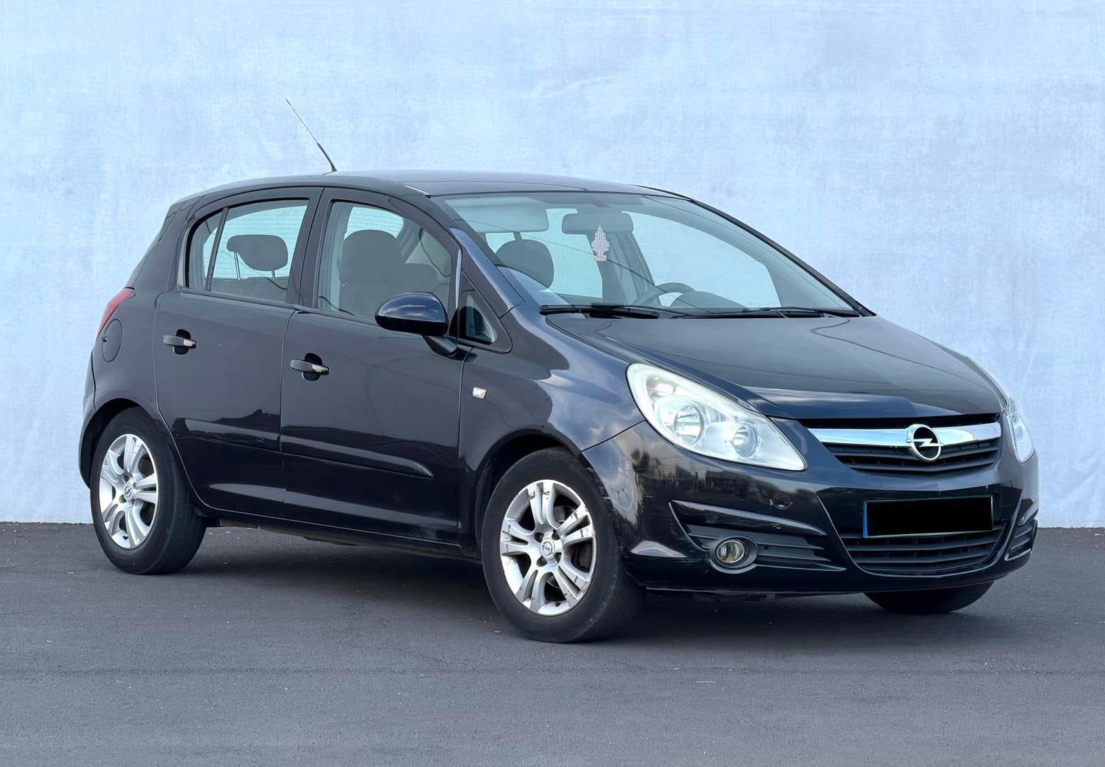 Opel Corsa 1.2 Essence automatique —  2007 avec rose paper, Autos, 57 kW, Achat, Entreprise, Rétroviseurs électriques