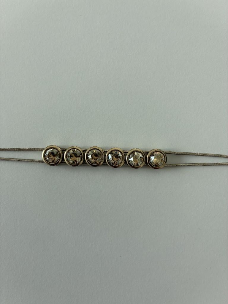 Armband swarovski, in perfecte staat, Handtassen en Accessoires, Overige materialen, Ophalen of Verzenden, Zo goed als nieuw, Goud