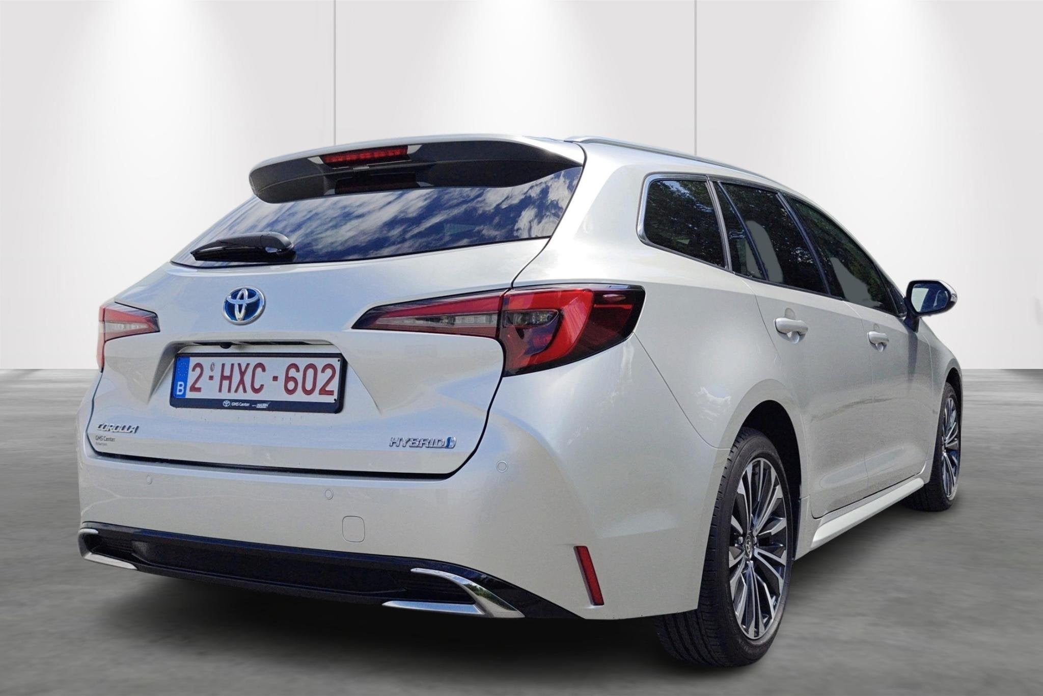 Toyota Corolla TS 1.8 Hybrid Style e-CVT - DEMO, Autos, Argent ou Gris, 750 kg, Noir, 5 portes