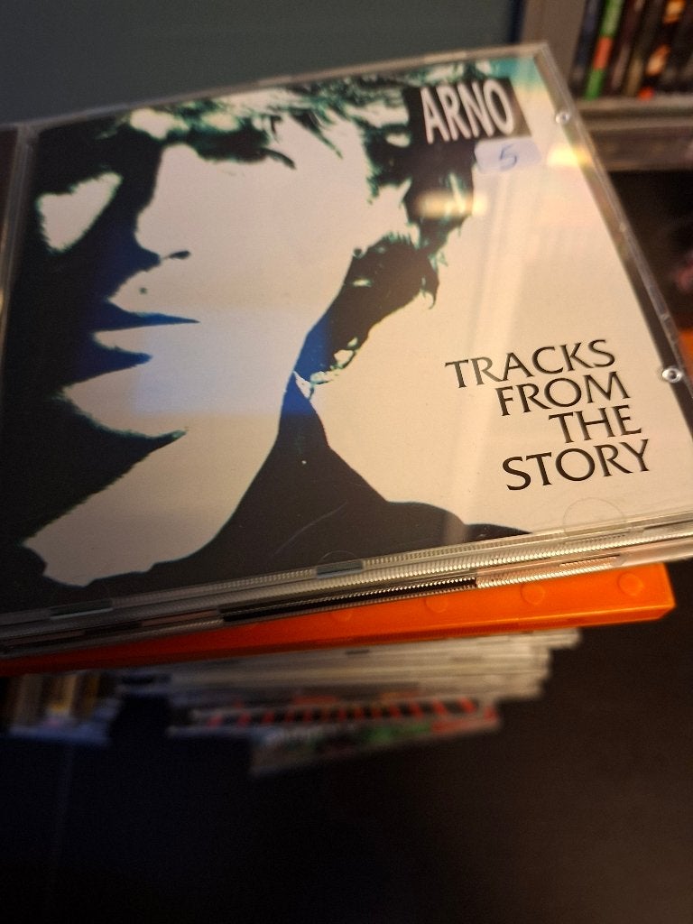 cd - arno - tracks from the story, Rock alternatif, Enlèvement ou Envoi, Comprend un livret, Comme neuf