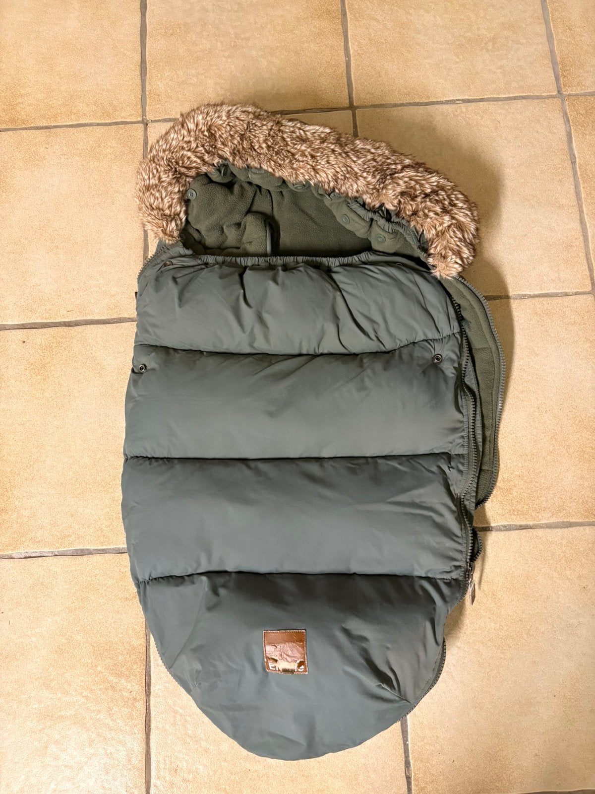 Winter voetenzak, Ophalen