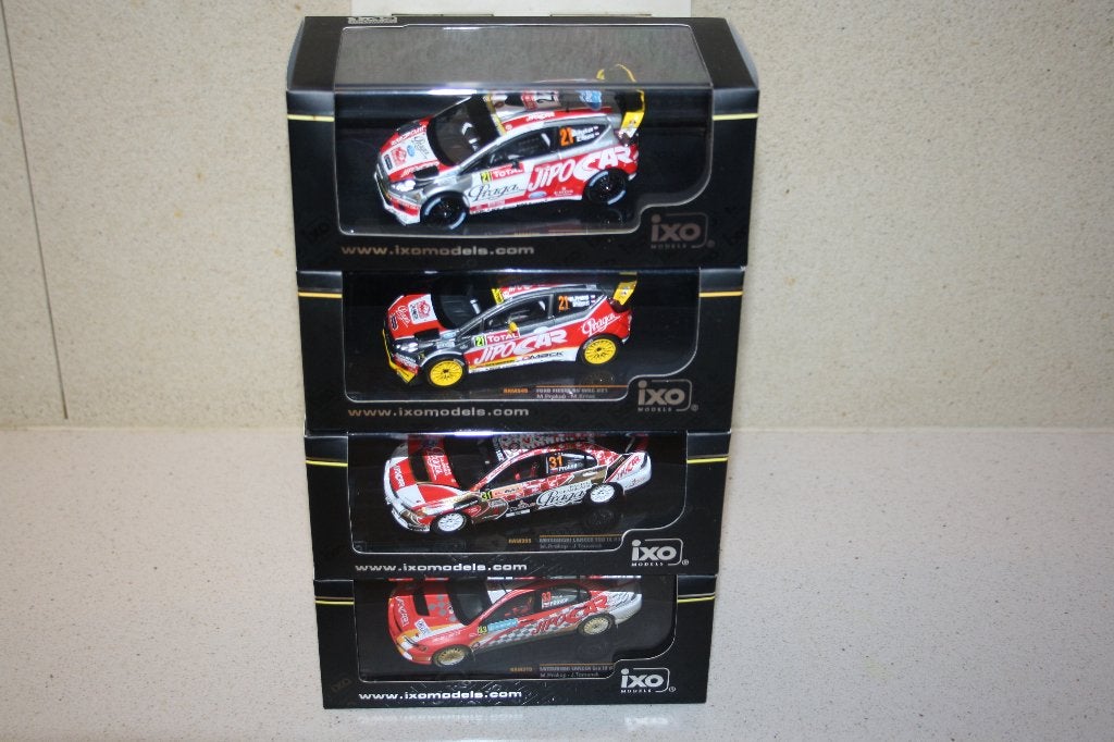 4 x 1:43 ixo mitsubishi/ford fiesta M.Propok rally WRC., Ophalen of Verzenden, Zo goed als nieuw, Auto