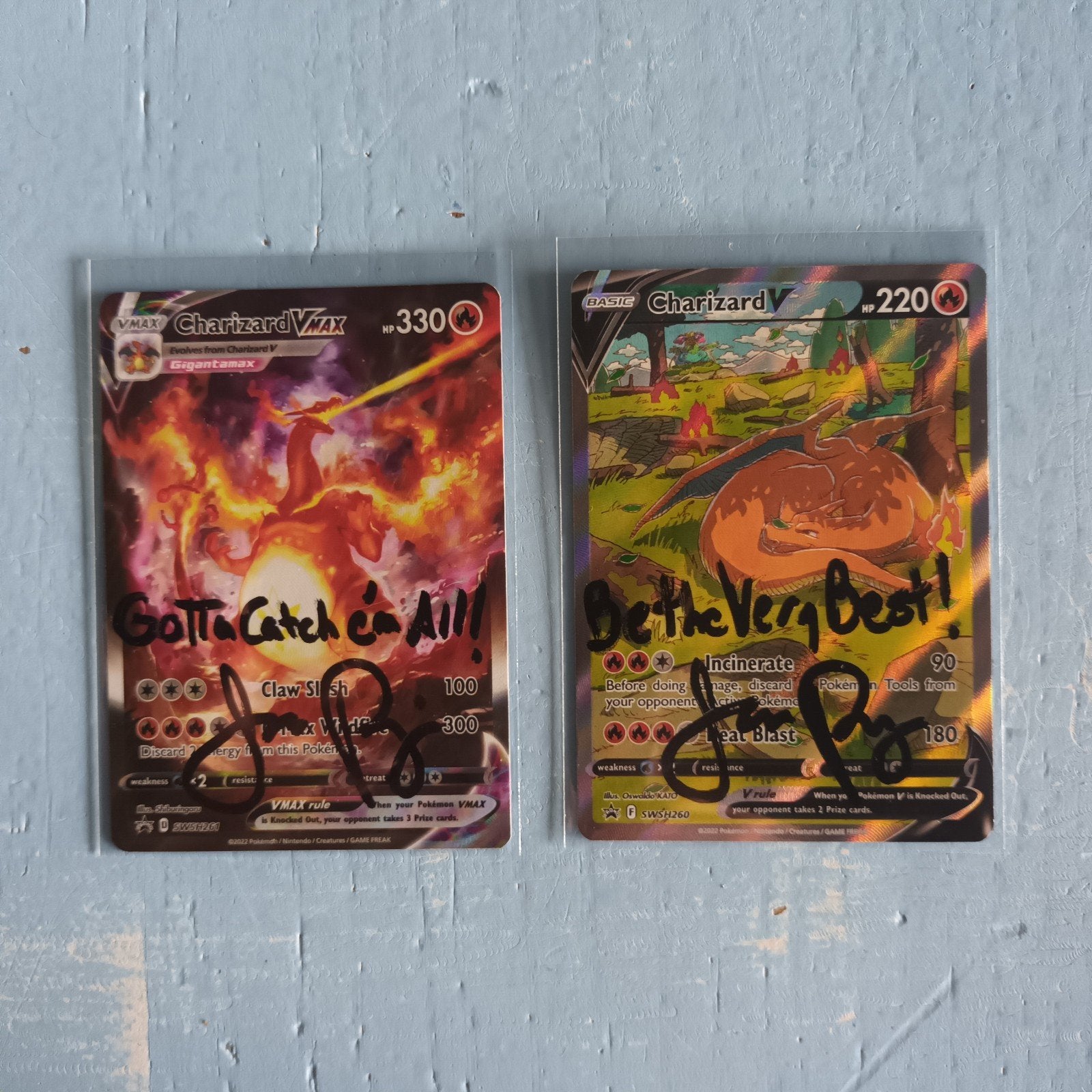 2x pokemon charizard Jason Paige, Ophalen of Verzenden