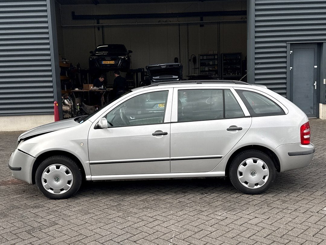 Skoda Fabia Combi 1.4-16V Comfort automaat, Auto's, Skoda, 450 kg, 4 cilinders, Startonderbreker, 180 g/km