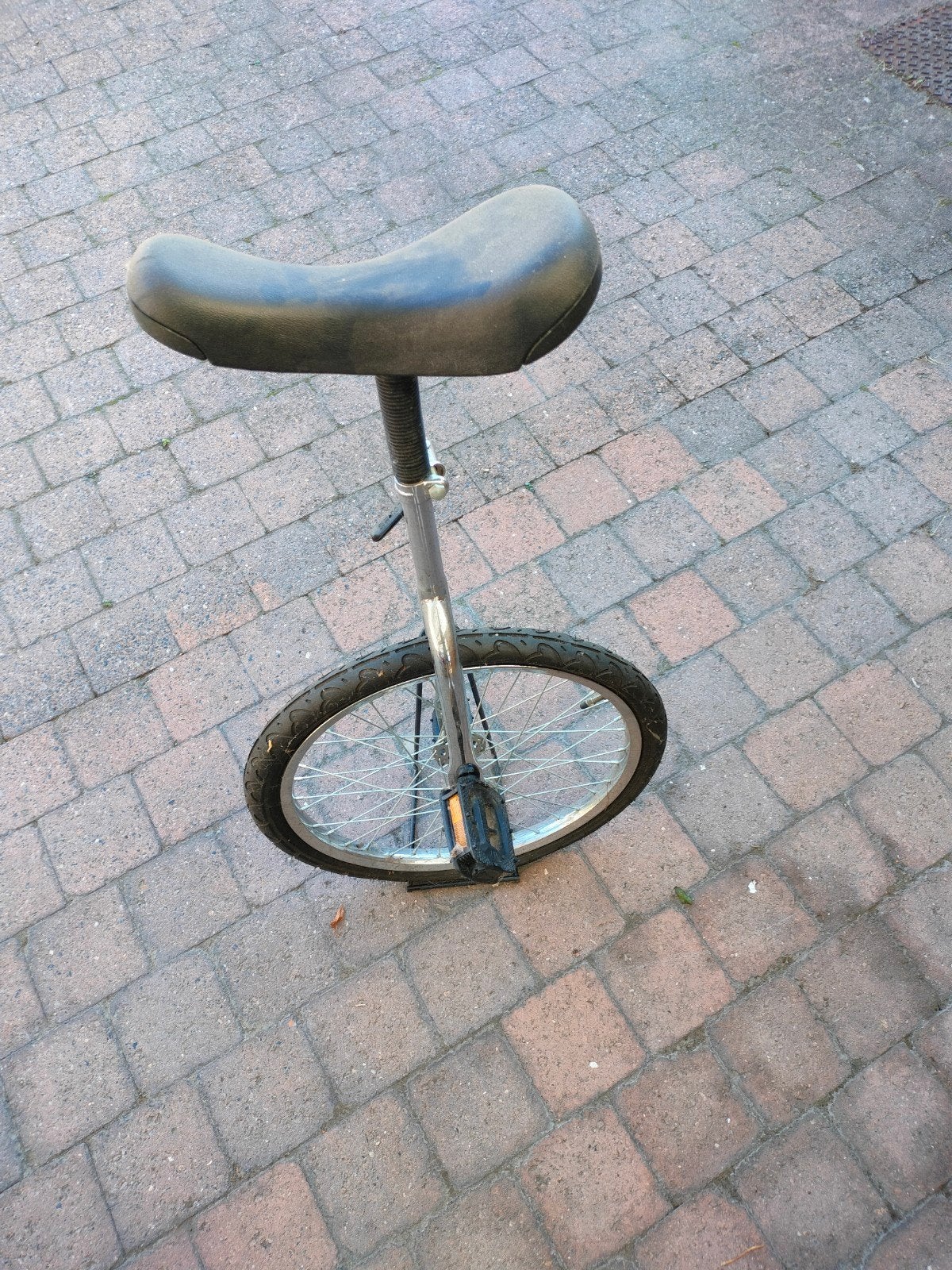 Eenwieler met steun, Fietsen en Brommers, Ophalen