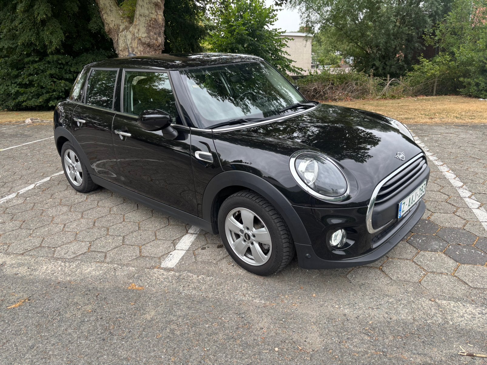 Zeer mooie Mini 5 deurs in top staat met garantie., Auto's, Mini, Voorwielaandrijving, Stof, Bedrijf, 3 cilinders