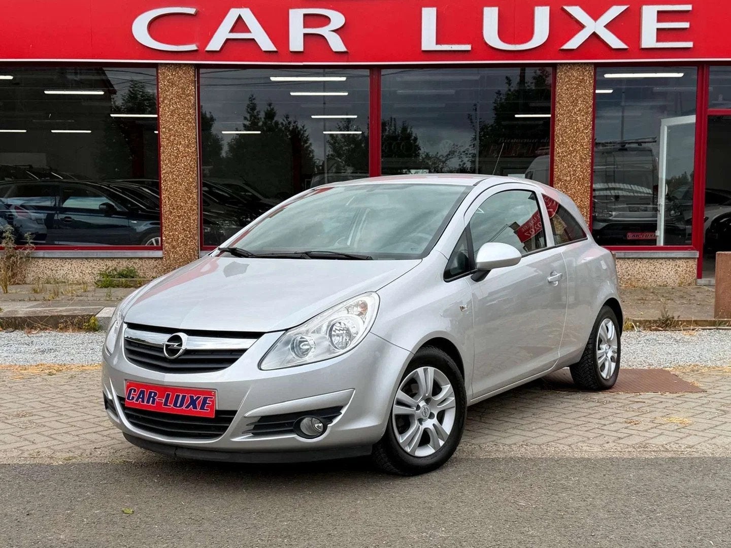 Opel Corsa 1.3I 80CV ESSENCE CLIM (bj 2009), Auto's, Opel, Stof, 4 cilinders, https://public.car-pass.be/vhr/6453b4bf-e372-4883-87d4-3cc54ffde9c2