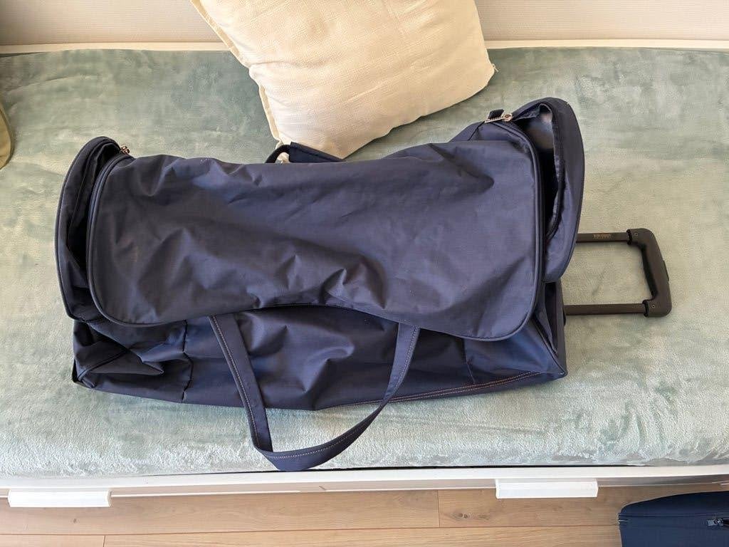 SAC DE VOYAGE, Enlèvement, Roulettes