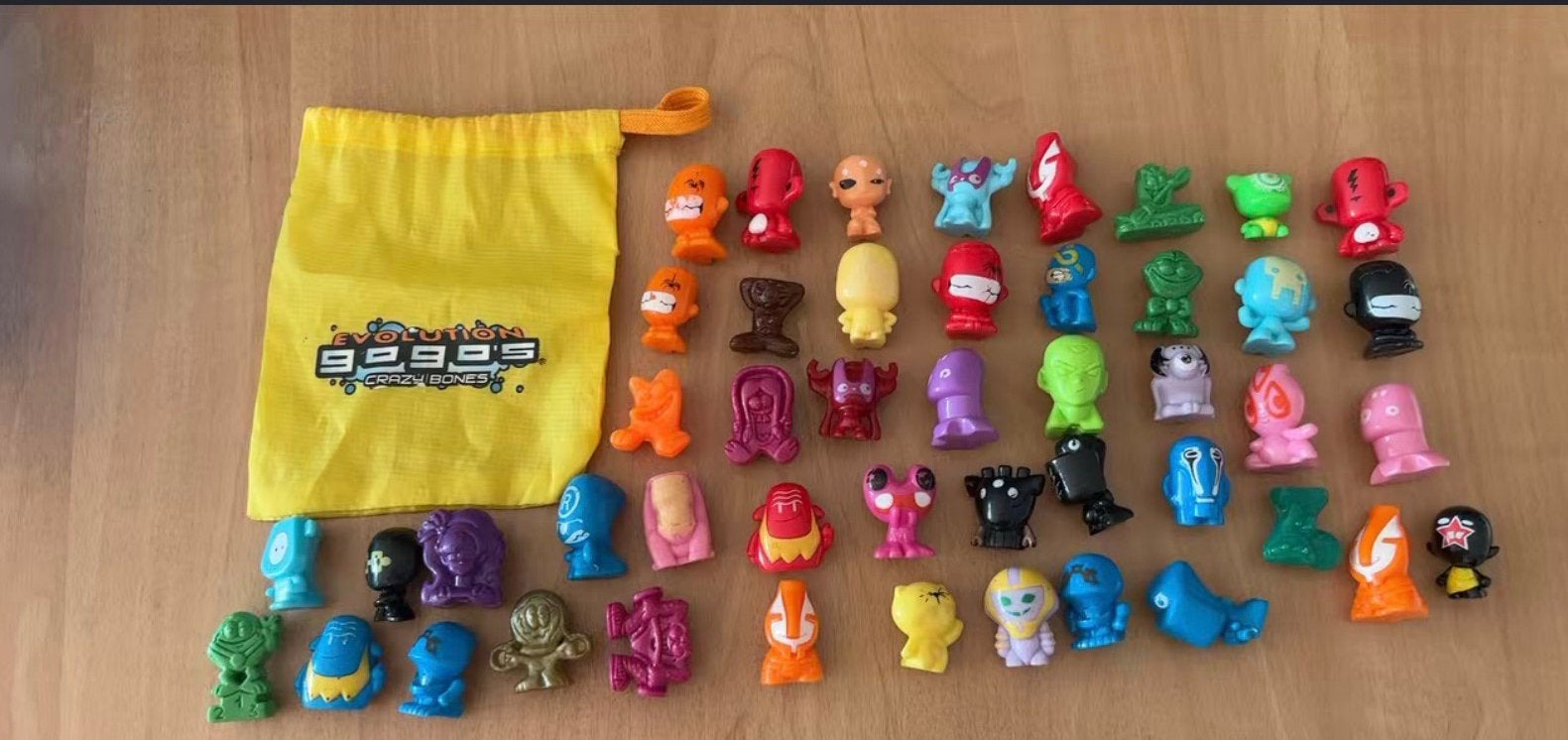 Lot van 45 Gogo's Crazy Bones +  Evolution Bewaarzakje, Ophalen of Verzenden, Zo goed als nieuw