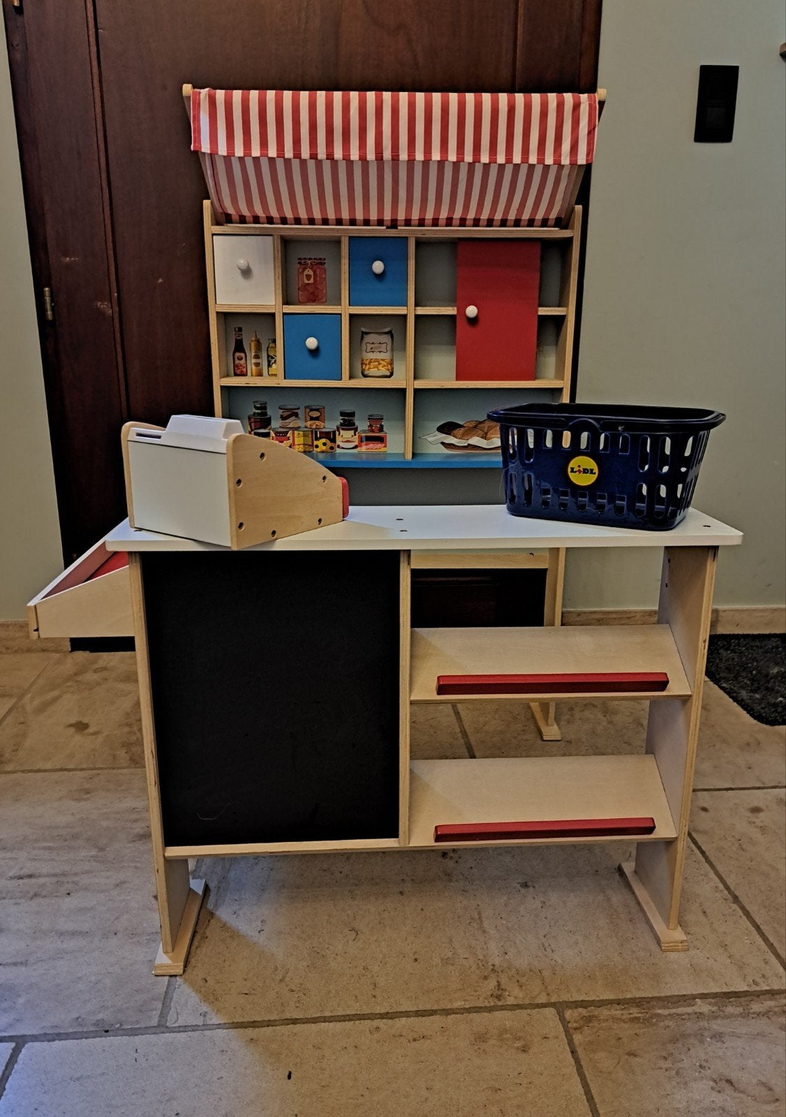 Speelgoedwinkeltje, Ophalen