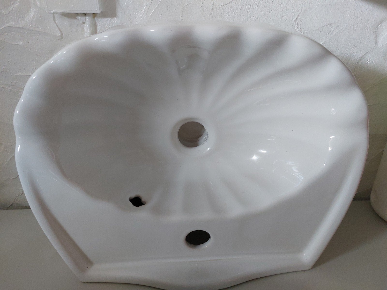Evier pour toilette, Enlèvement