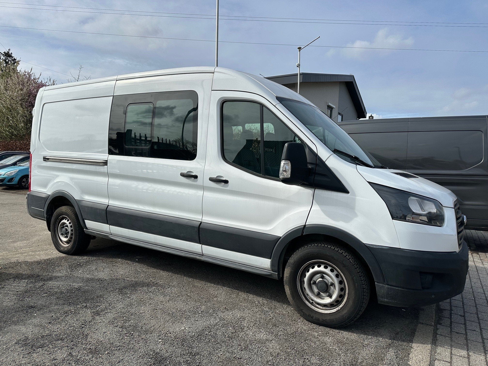 Ford Transit 2.0 TDCi L2H2 6 Zit Navi Leder Airco Camera Pdc, Auto's, Voorwielaandrijving, Gebruikt, 4 cilinders, Wit