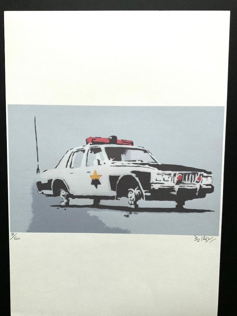 BANKSY Police car litho genummerd en met reliëfstempel, Enlèvement ou Envoi