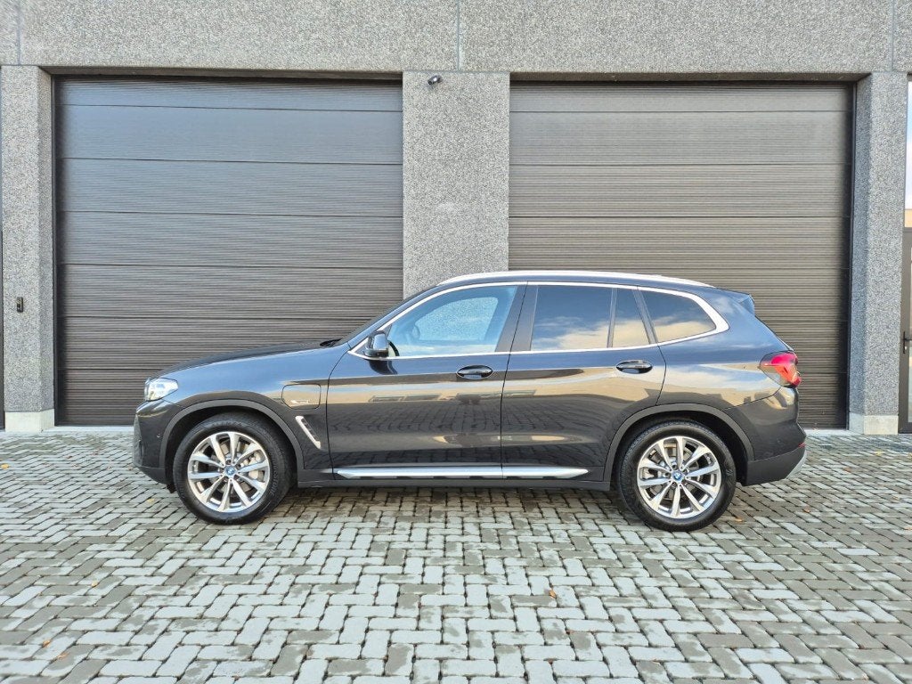 BMW X3 xDrive 30e Trekhaak Pano Keyless HUD, Autos, BMW, Cuir, Argent ou Gris, Achat, Euro 6