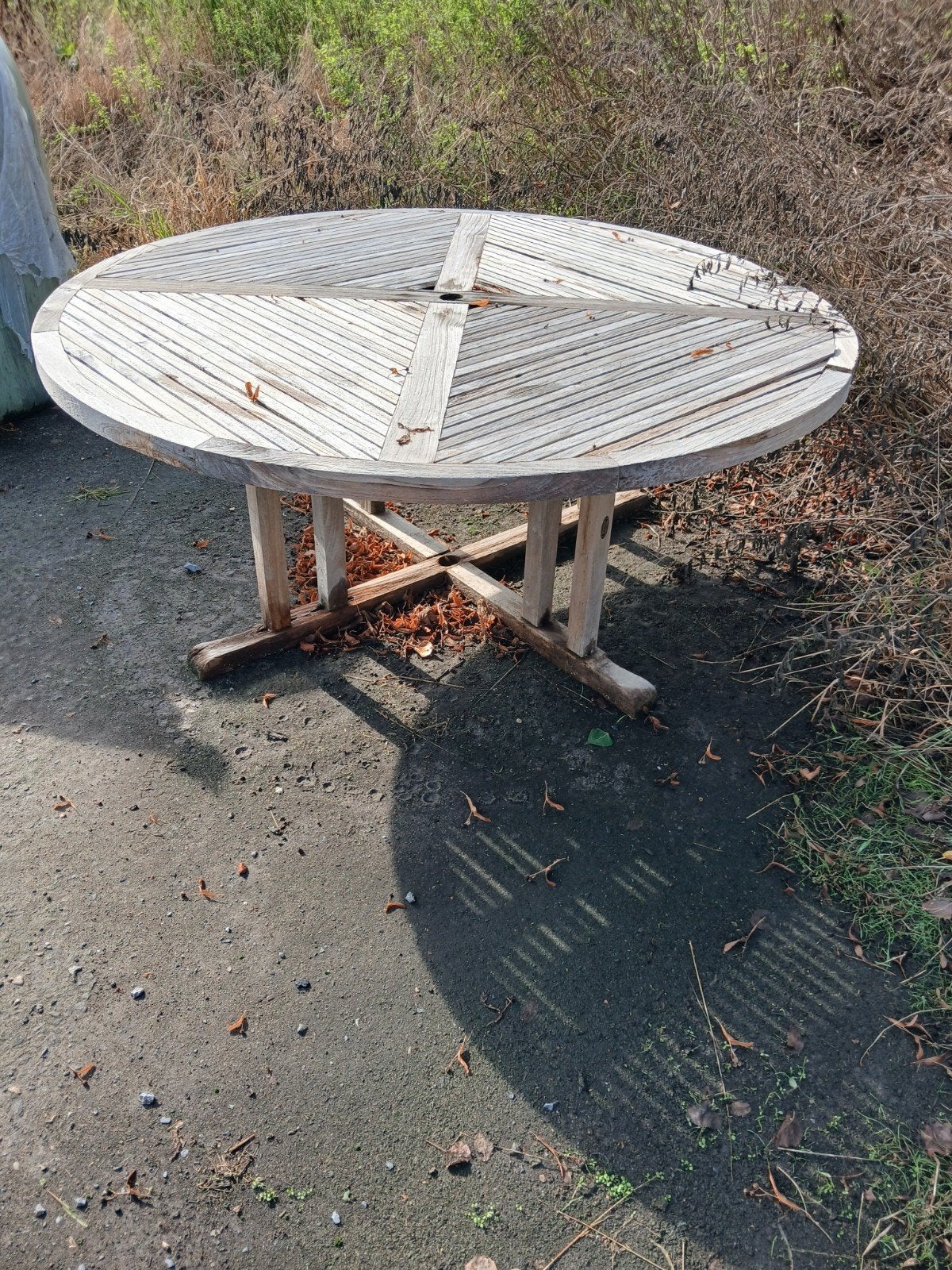 teak tafel, Ophalen