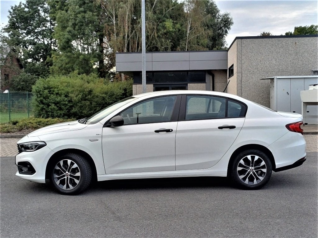 Fiat Tipo 1.0 Turbo 101pk Sedan Facelift  ✅1 Jaar Waarborg, Voorwielaandrijving, Stof, Wit, Start-stop-systeem
