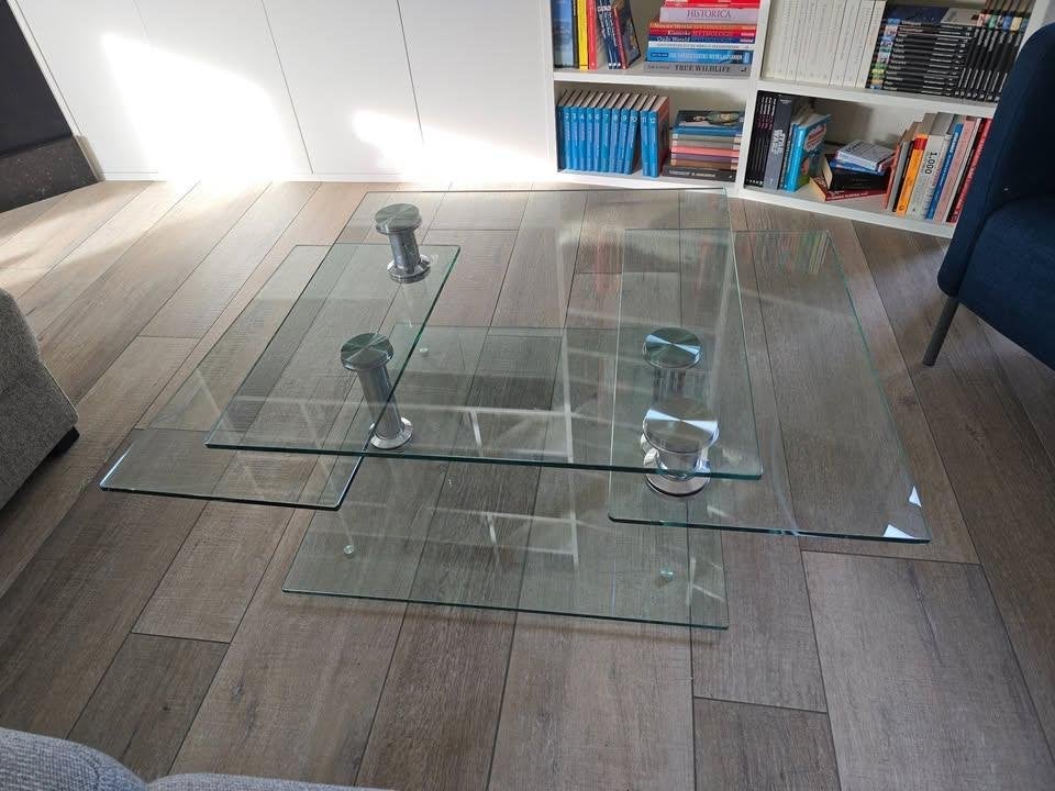 Design salontafel Ronald Schmitt – Glazen draaitafel (RVS), Ophalen, Gebruikt, 100 tot 150 cm, Vierkant