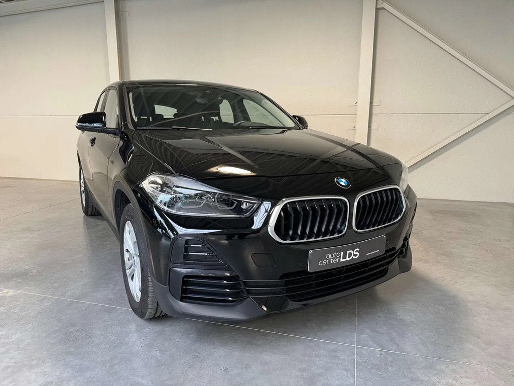 BMW X2 1.5iA xDrive25e HYBRIDE - LED - NAVI - (bj 2020), Automaat, Gebruikt, Lichtsensor, 1820 kg