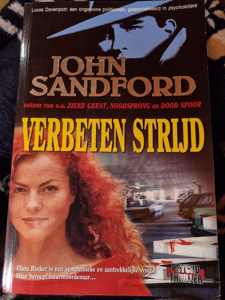 Boek John Sandford  -  Verbeten strijd, Boeken, Ophalen of Verzenden, Zo goed als nieuw, John Sandford, Amerika
