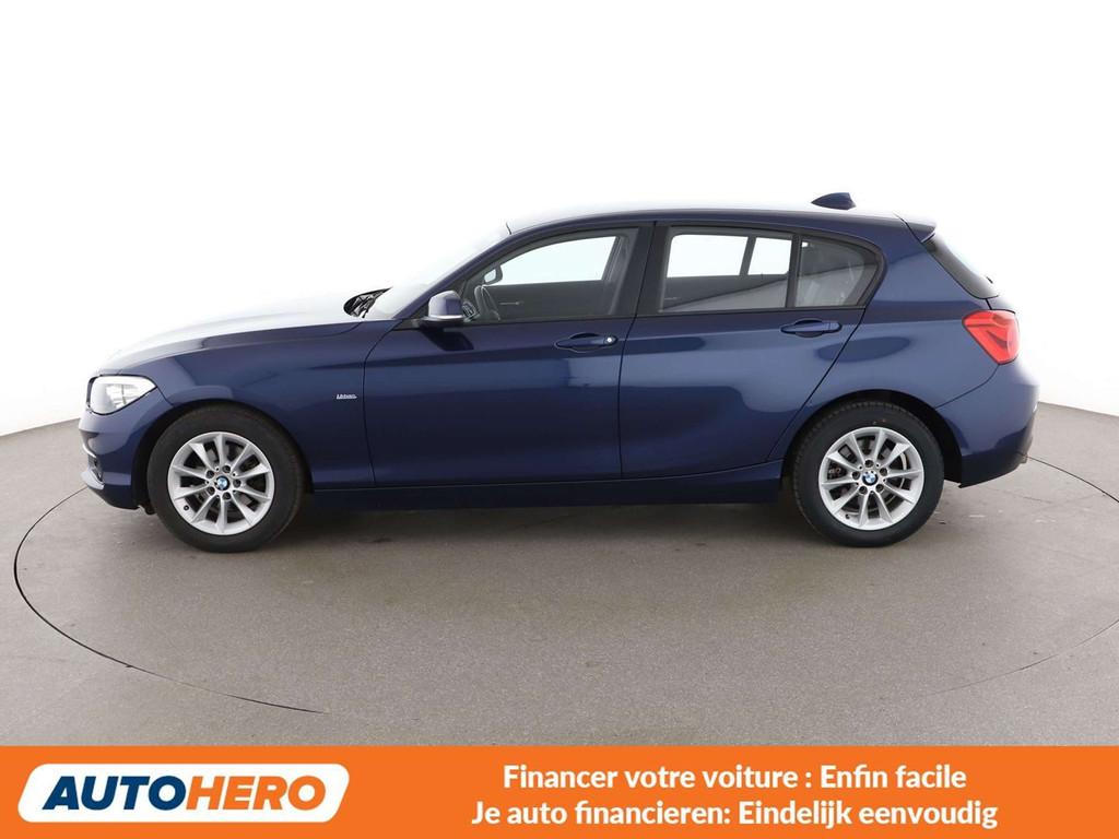BMW 1 Serie 118 118i Urban Line (bj 2016, automaat), Auto's, Zwart, 5 deurs, 1395 kg, https://public.car-pass.be/vhr/7f595de0-80ab-4b2c-9948-8d951681840e