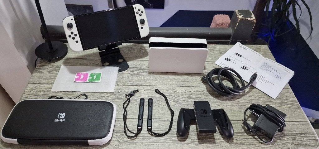 Nintendo Switch OLED-console (compleet + garantie), Games en Spelcomputers, Ophalen of Verzenden, Zo goed als nieuw