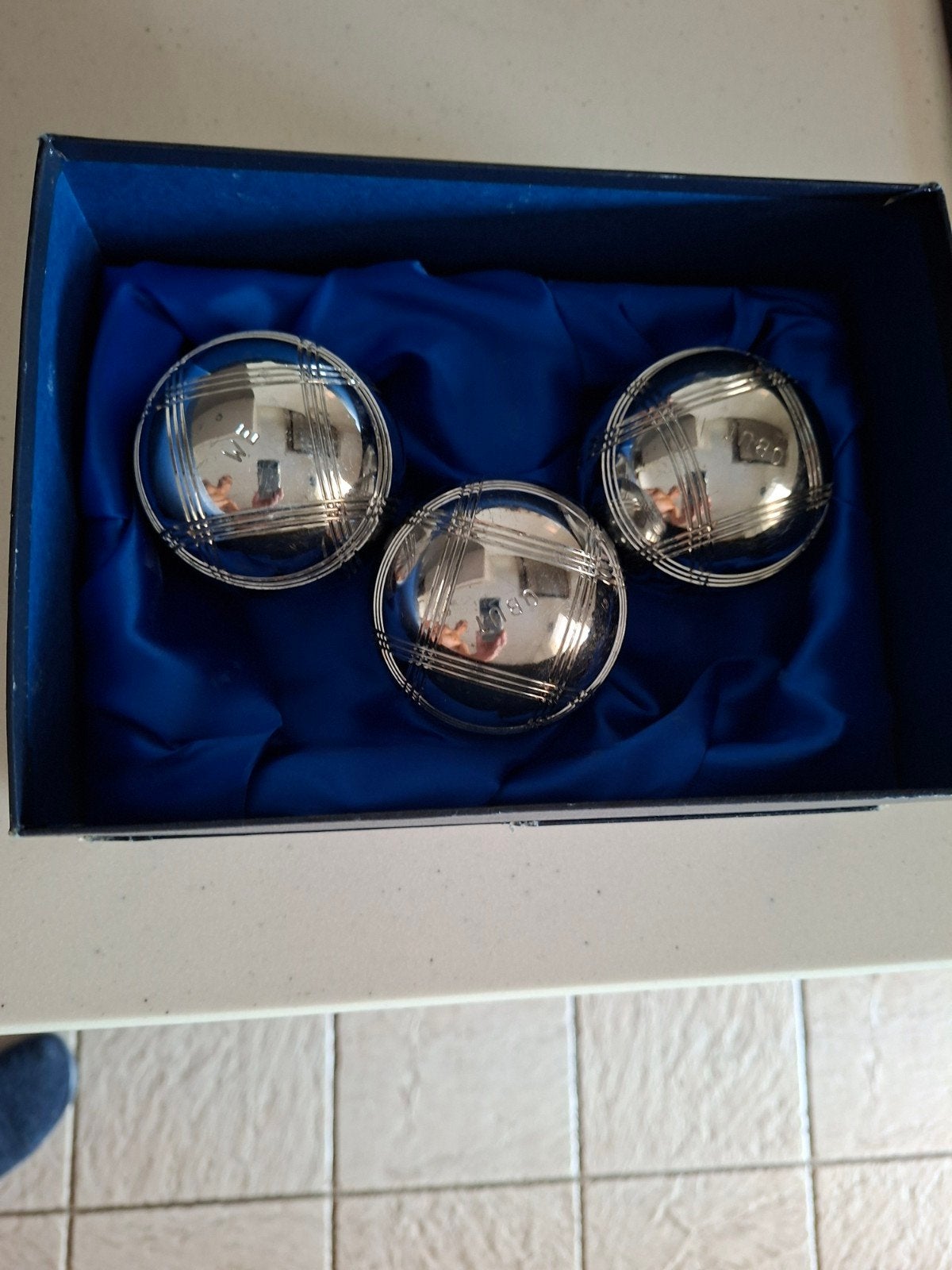 Petanqueballen obut, Ophalen