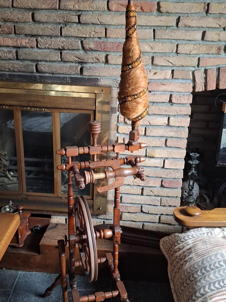 Oude spinnewielspinmachine, Ophalen